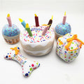 Birthday cake, cupcake, and bone-shaped plush dog toys