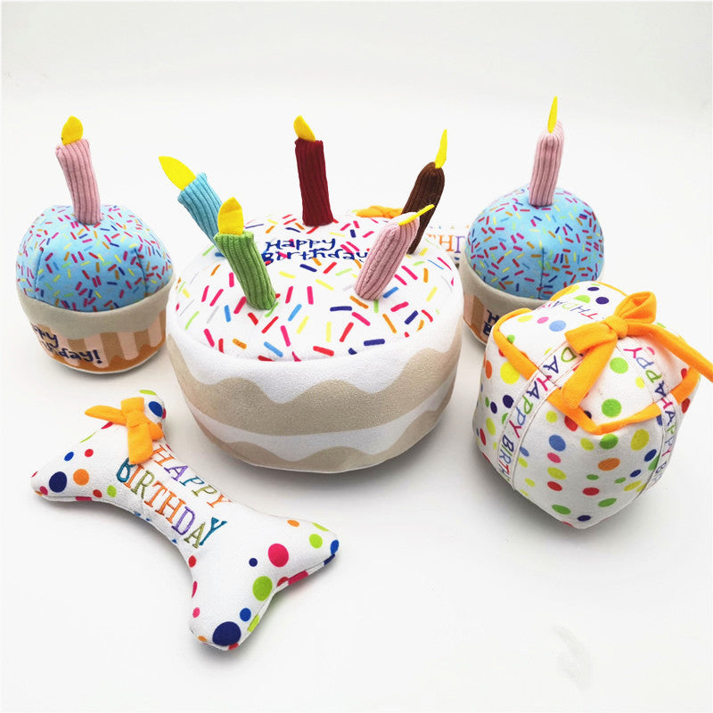 Birthday cake, cupcake, and bone-shaped plush dog toys